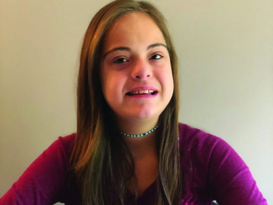 a female homeschool student smiling