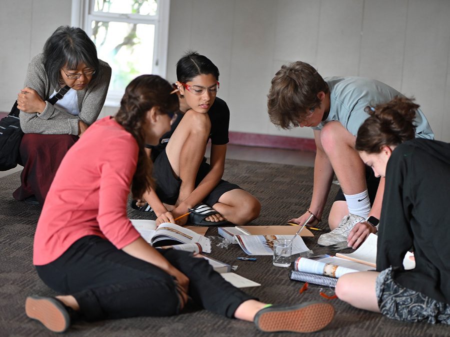 A homeschool director leading community with students.