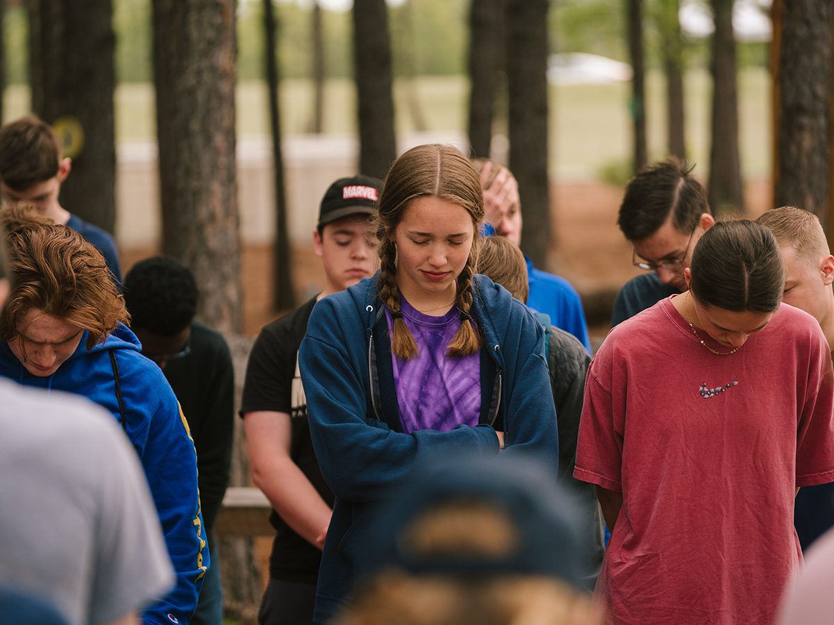 Students gather in prayer.