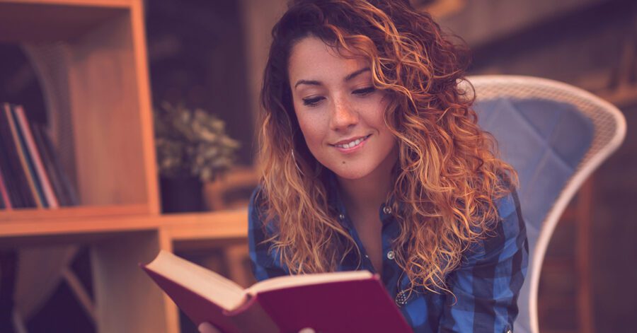 Why Read Classic Literature: a woman reads a work of classic literature.